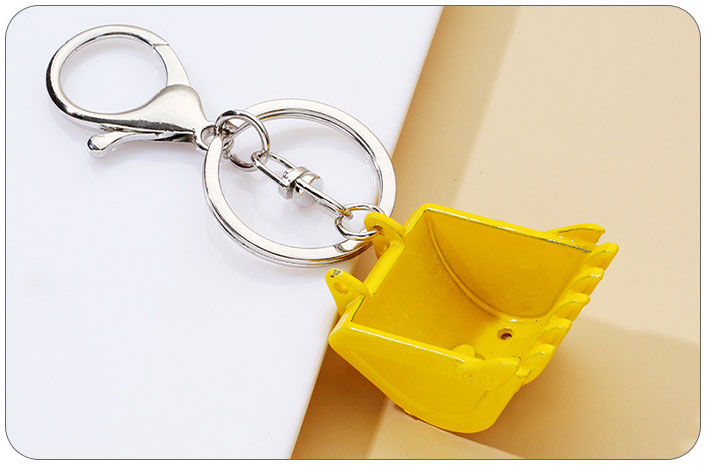 سلسلة مفاتيح حفارة معدنية إبدا - مراجعة Heavy Equipment Keychain وسعره