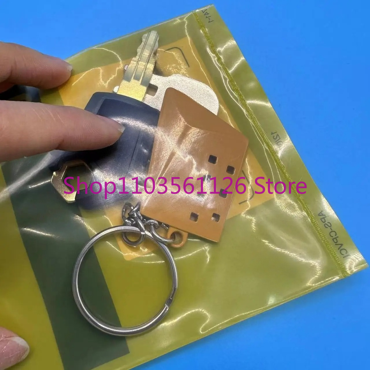 سلسلة مفاتيح 5P8500 8H5306 مع  - مراجعة Heavy Equipment Keychain وسعره