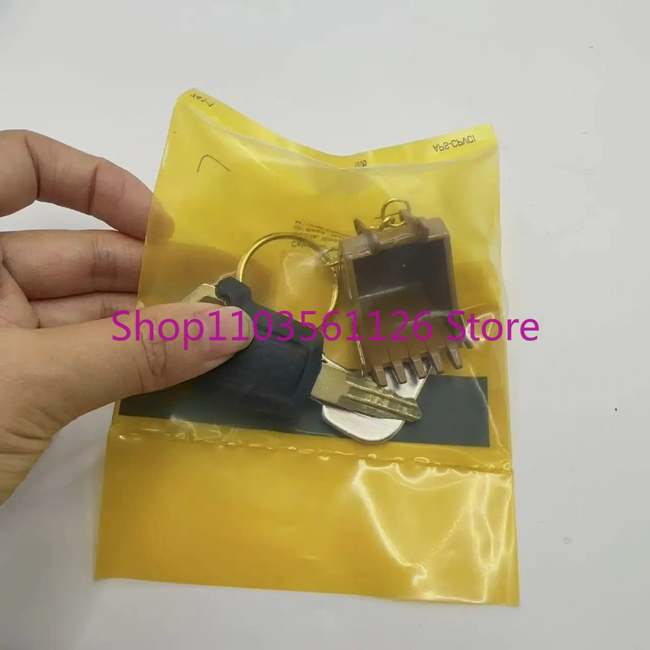 سلسلة مفاتيح 5P8500 8H5306 مع  - مراجعة Heavy Equipment Keychain وسعره